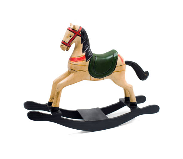 istock retro wooden horse on a white background. 1716345161