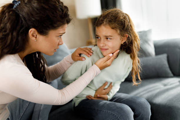 istock Mommy, my stomach hurts really bad! 1716354407