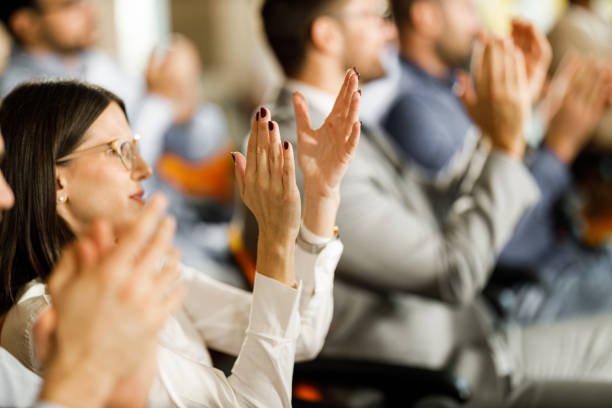 istock Applauding on education event in board room! 1716358897