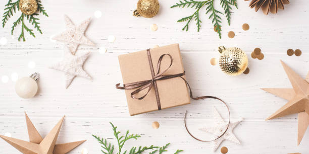 istock Festive Christmas background with gift box and Christmas decorations 1716364778