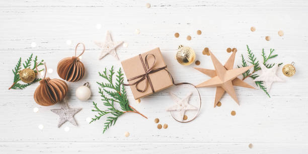 istock Festive Christmas background with gift box and Christmas decorations 1716364779