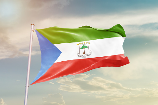 Equatorial Guinea waving flag in the sky.