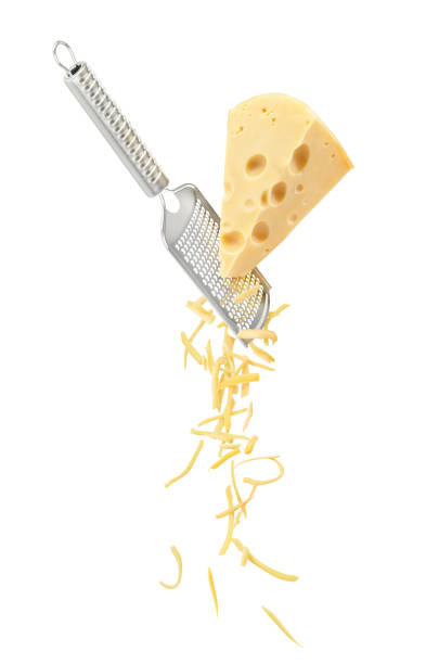 a large piece of cheese is grated and falls down in small pieces isolated on a white background - grated imagens e fotografias de stock