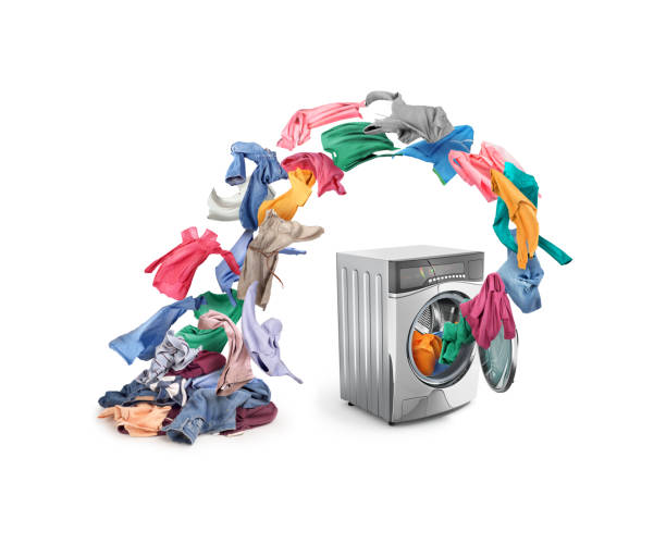 istock Unwashed items fly into the washing machine 1716370944