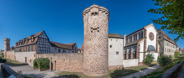 Honau - Reutlingen, Germany - September 30th, 2018: Done point of view Panorama over the Swabian Jura - Schwäbische Alb - with beautiful fairy-tale Castle Lichtenstein on top a steep rock on a sunny late summer day. Swabian Alb, Reutlingen, Baden Wurttemberg, Germany, Europe