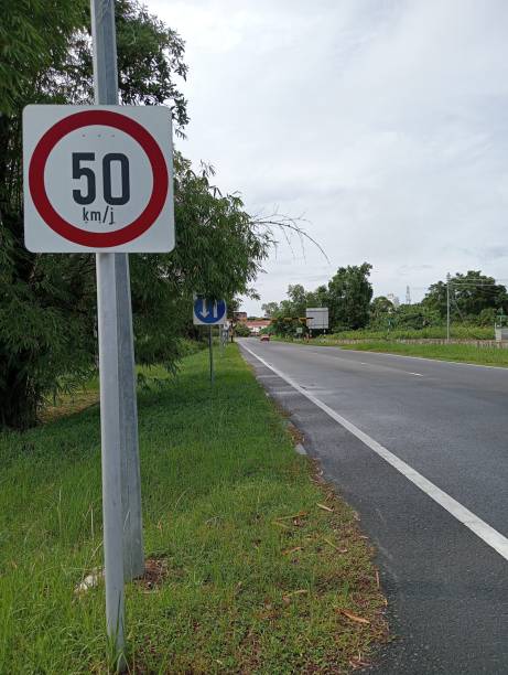 istock Speed 50 km per hour limits road sign board 1716378742