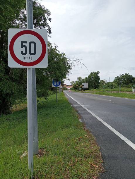 istock 50 kilometers per hour limits road sign board side 1716378758