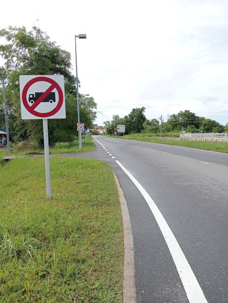 istock No container truck pass road traffic sign board 1716378787
