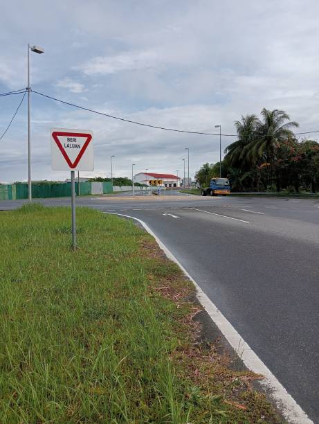 istock Round a road and traffic sign board 1716378889
