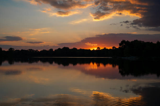 istock beautiful summer sunset on a lake in bavaria 1716379069