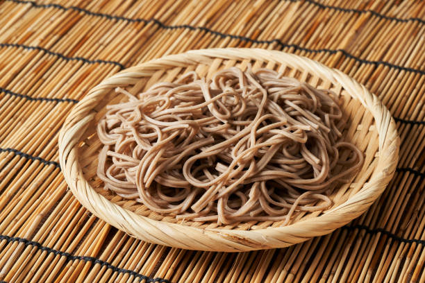 istock soba noodle on bamboo mat table background. soba noodle table background. soba noodle 1716379729