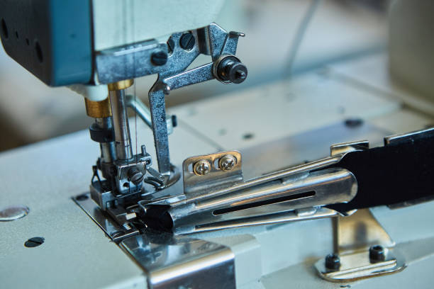 istock Industrial sewing production or atelier. Sewing machines for creating clothes. 1716385512