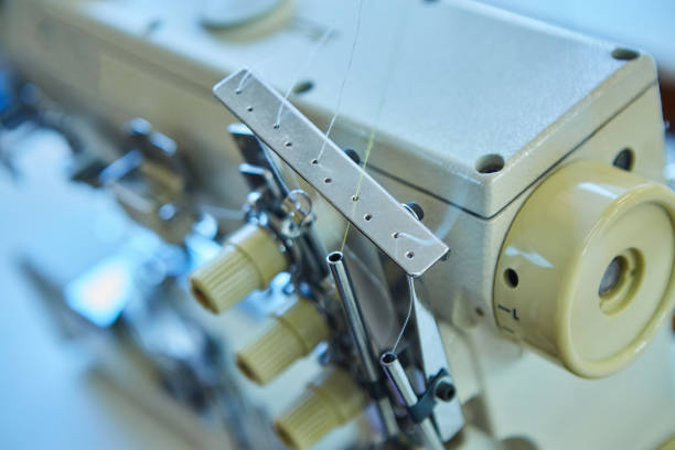istock Industrial sewing production or atelier. Sewing machines for creating clothes. 1716385541