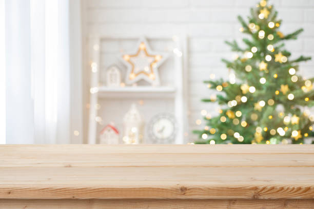 istock Christmas holiday background with table for gift or product display 1716401392