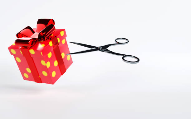 istock 3D rendering of a gift box with scissors on white background, cutting open gift box, open surprise and present concept 1716407118