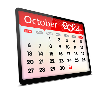 October 2024 calendar on digital tablet isolated on white with clipping path.