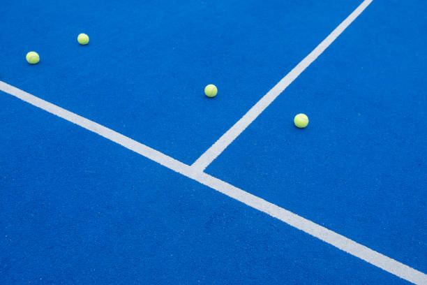 istock selective focus, four balls on a paddle tennis court. 1716446136