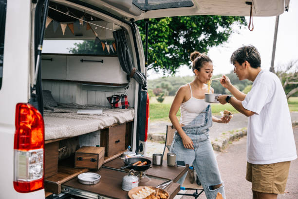 istock Japanese couple eating their vanlife dinner 1716460147