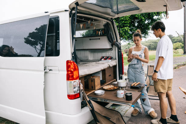 istock Japanese couple using their phone while cooking 1716460684