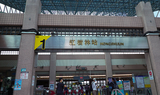 New Taipei City, Taiwan; 8 Aug 2023: passengers prepared to enter the station.