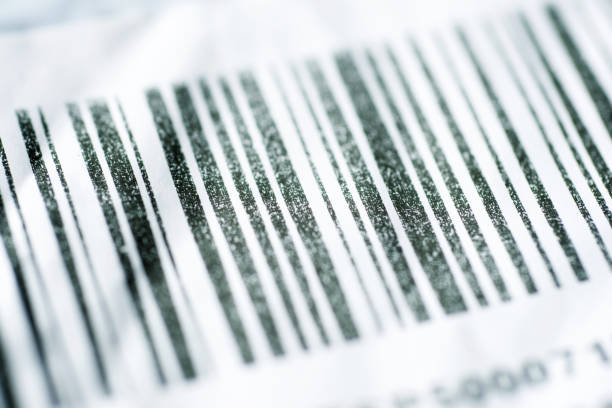 Close-up of a barcode printed on paper Close up of a barcode printed on brown cardboard traceability stock pictures, royalty-free photos & images