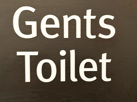 gents toilet sign at street of glasgow scotland england UK