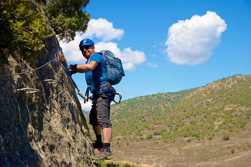 Climbing a ferrata route in Calcena, Zaragoza province, Aragon in Spain