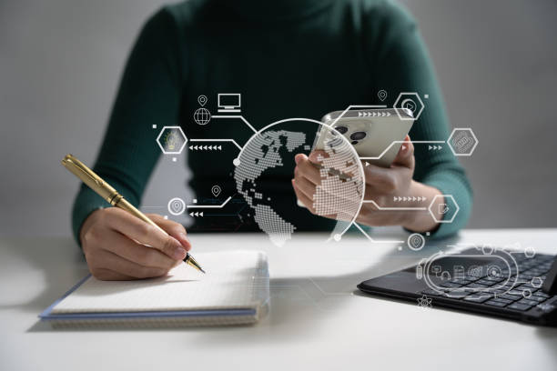 istock Elearning online working concept. Business man working on laptop computer, searching and taking note on paper notebook with pen working in office. 1716505158