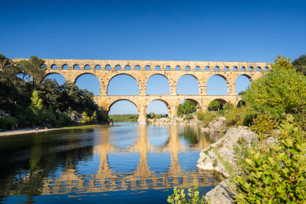 istock Pont du Gard: UNESCO World Heritage Site, Ancient Roman Aqueduct, Historical monument, Engineering marvel in South of France, Touristic place 1716517179
