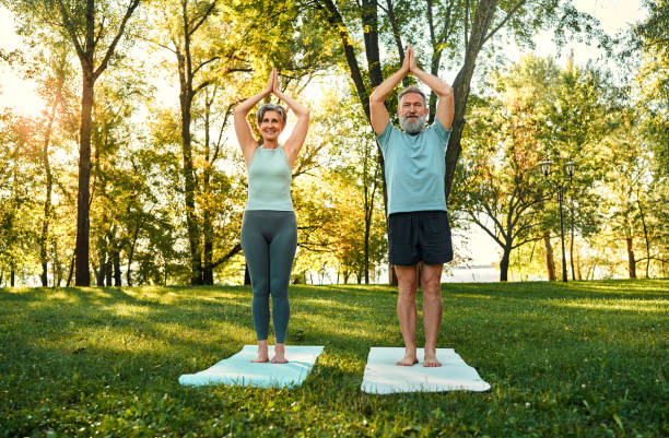 istock Vrksasana performance outdoors. 1716517181