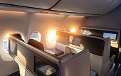 Modern airplane interiors, luxury first class and business class seats with entertainment area