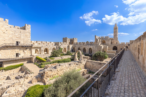 Horizontal landscape photo of the ancient Citadel known as the Tower of David, near the Jaffa gate entrance to the Old City, Jerusalem