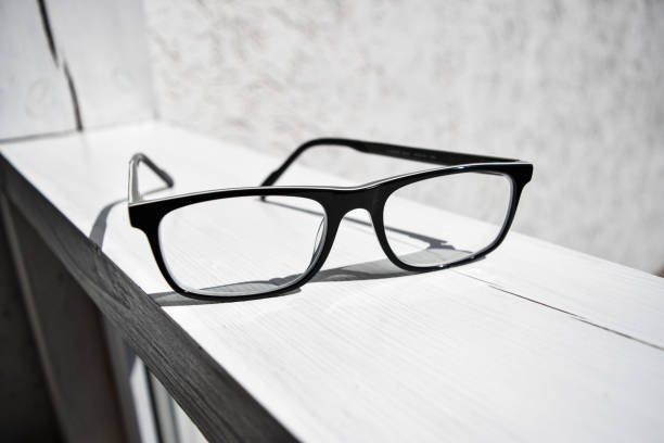 istock Glasses with clear lenses and black frames 1716545442
