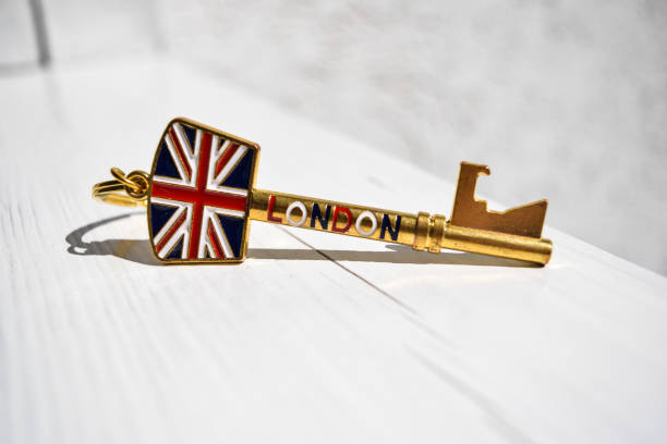 istock Golden key with ring and british flag 1716545470