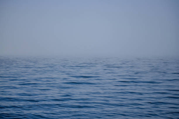 istock White fog falls on blue water in the open sea 1716546006
