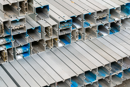 Aluminum sheet metal on the table of a warehouse. scrap metal products