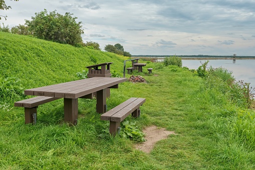Picnic area by the river. Nice view from the top. Latvian nature. Positive photo.