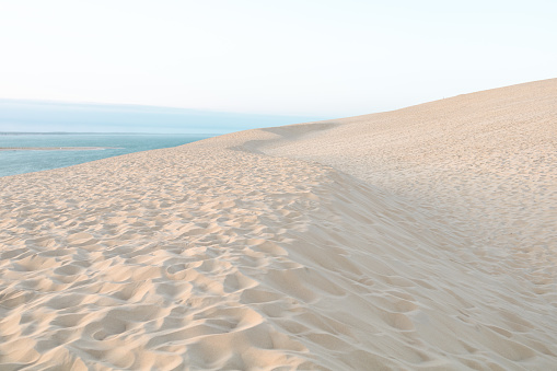 Stunning Erg Chebbi sand dunes in the Moroccan Sahara Desert at sunrise