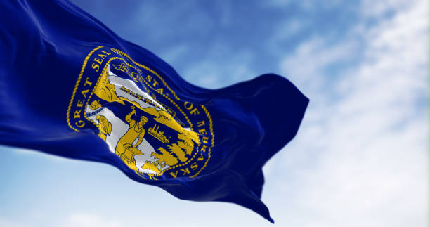istock Nebraska state flag waving in the wind on a clear day 1716596221