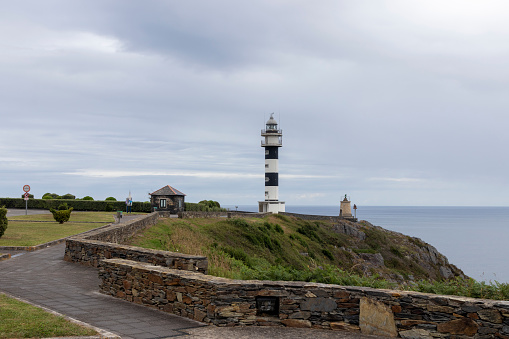 Majestic Asturian Coast: Iconic Lighthouse Stands Tall on the Scenic Cantabrian Sea in Northern Spain