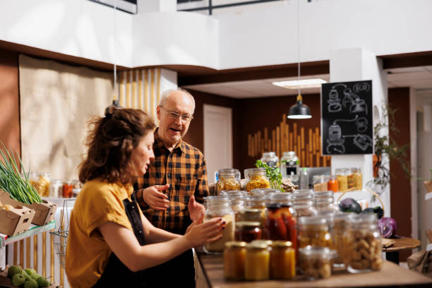 istock Clients in local eco friendly shop 1716643284