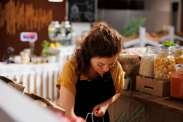 istock Woman buys eco friendly food 1716643628