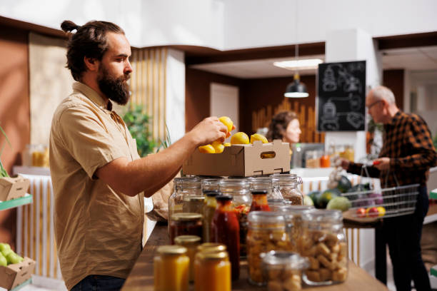 istock Man checks lemons are locally grown 1716645566