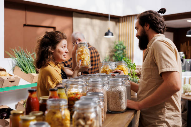 istock Woman presenting food at local event 1716651496