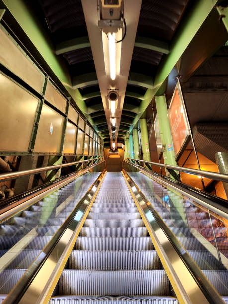 View of the Central–Mid-Levels escalator in Hong Kong, the longest outdoor covered escalator system in the world. The system covers over 800 m in distance and traverses an elevation of over 135 m from bottom to top.