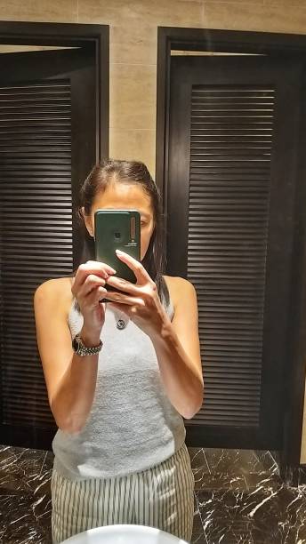 istock Elegant mobile selfie of a young lady 1716709370