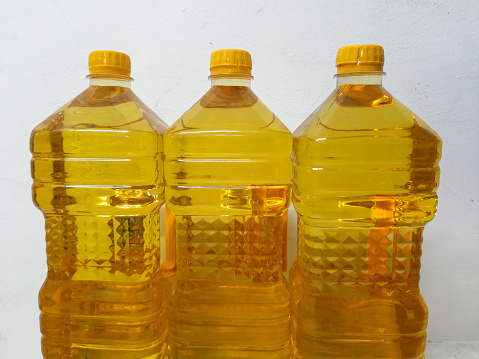 cooking oil in bottles on a white background