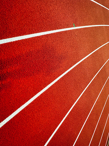Converging lines on the corner of a running track