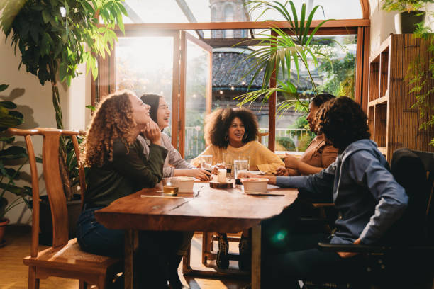 istock A group of friends during a dinner party together 1716758323