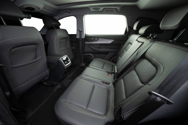Leather car salon Leather car salon with rear seats and isolated windows Haval H9 SUV stock pictures, royalty-free photos & images